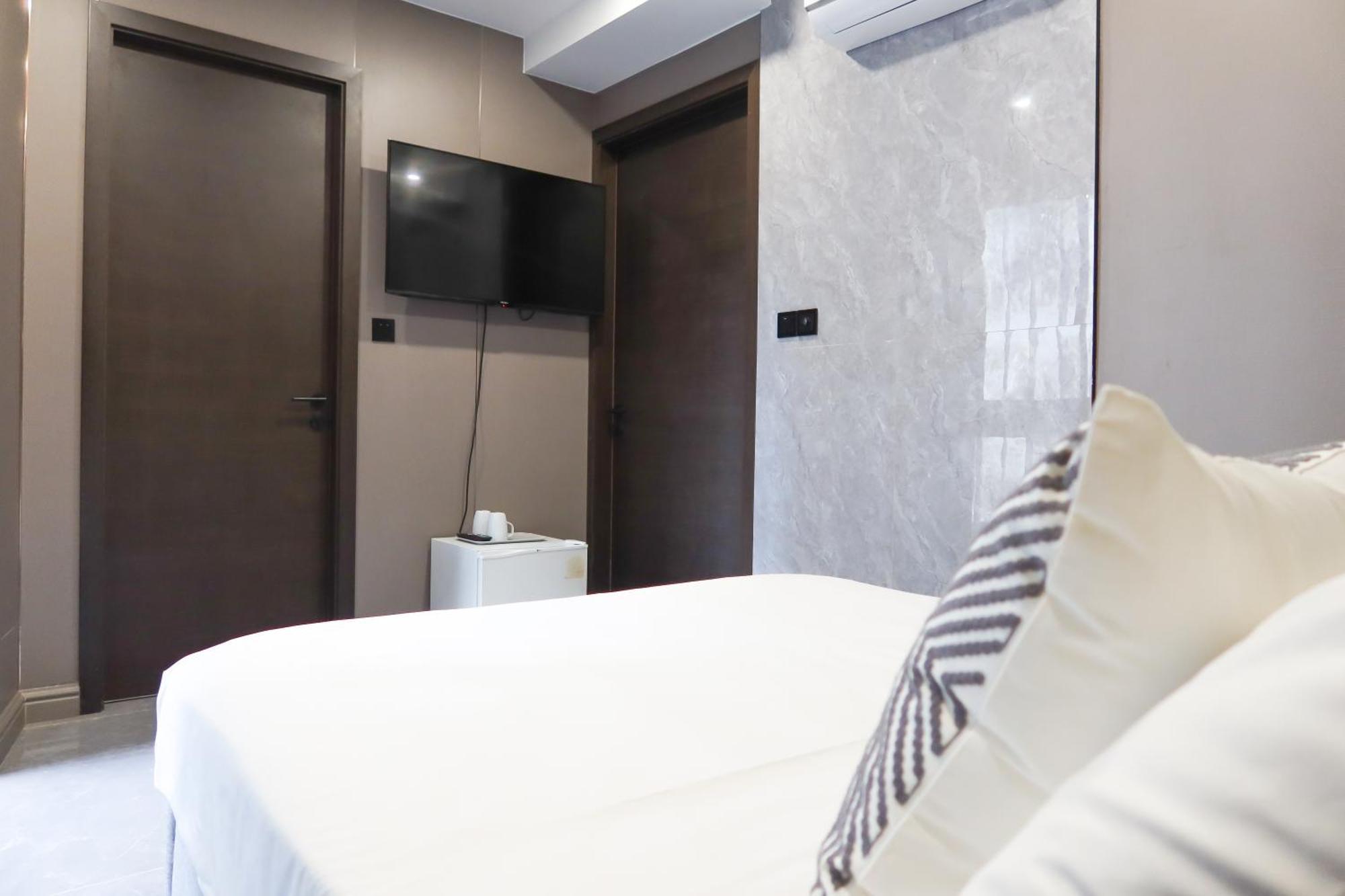 Recharge Studio Apartment & Suites Singapura Bilik gambar