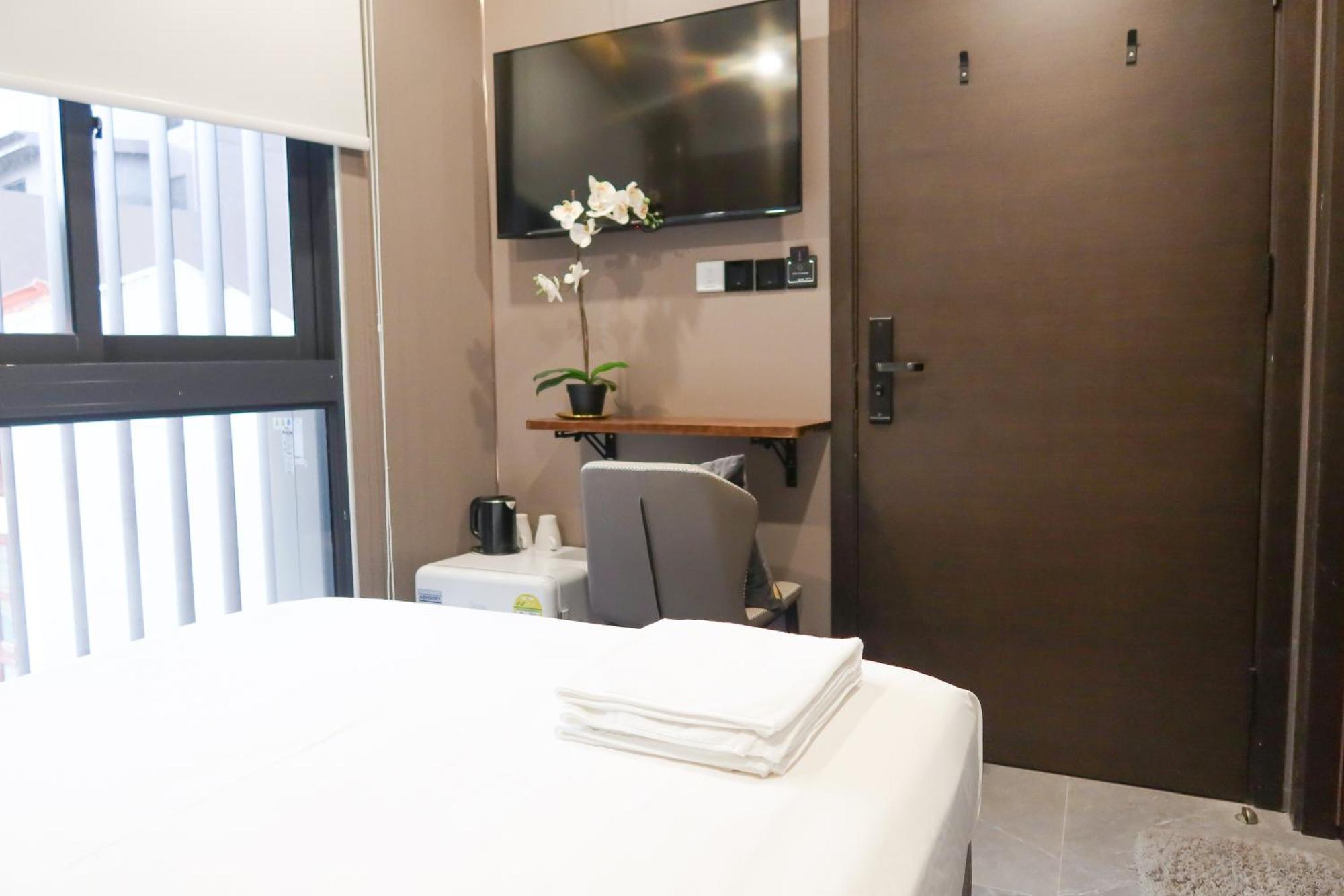 Recharge Studio Apartment & Suites Singapura Bilik gambar
